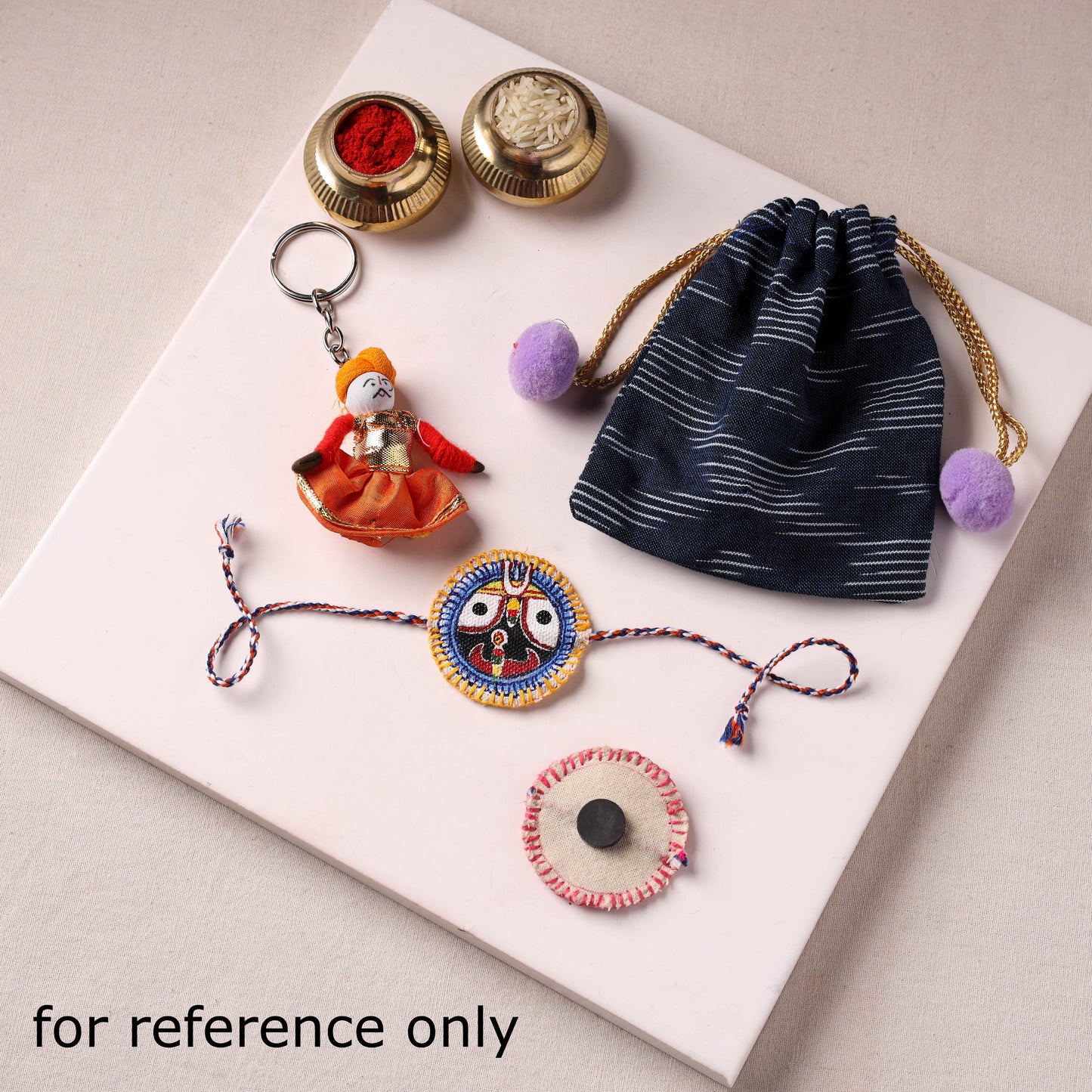 Lord Jagannath - Reusable Pattachitra Handpainted Rakhi with Potli 25