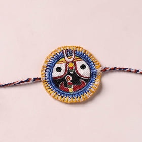 Lord Jagannath - Reusable Pattachitra Handpainted Rakhi with Potli 57