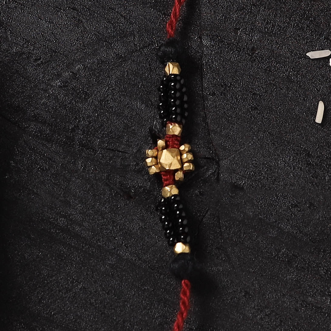 Red - Handcrafted Tribal Dokra Brass Thread Rakhi with Banaras Wood Doll Box 38