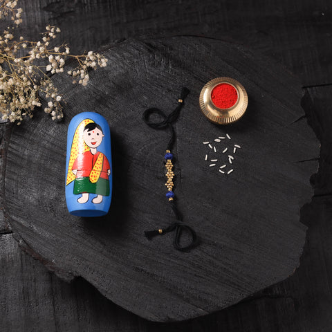 Black - Handcrafted Tribal Dokra Brass Thread Rakhi with Banaras Wood Doll Box 39