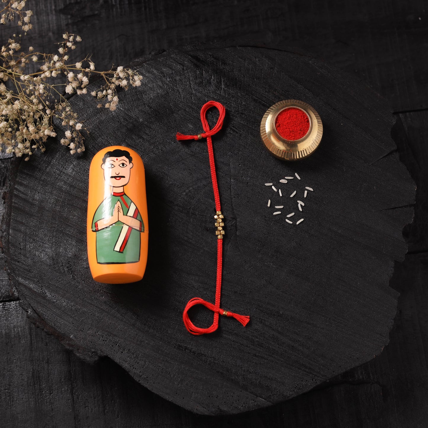 Red - Handcrafted Tribal Dokra Brass Thread Rakhi with Banaras Wood Doll Box 42