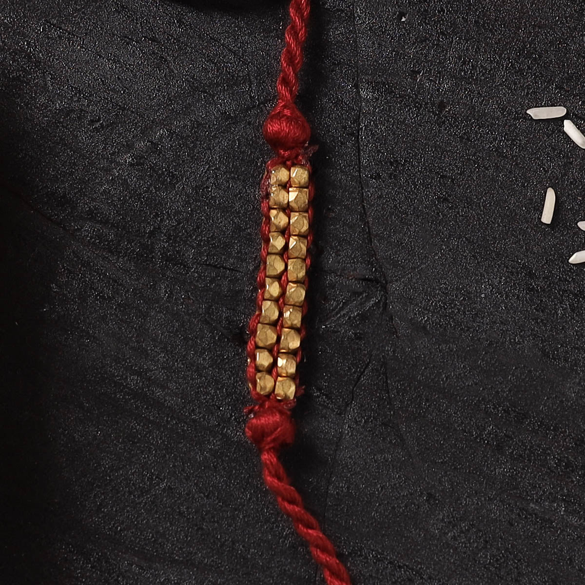 Red - Handcrafted Tribal Dokra Brass Thread Rakhi with Banaras Wood Doll Box 43