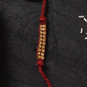Red - Handcrafted Tribal Dokra Brass Thread Rakhi with Banaras Wood Doll Box 43