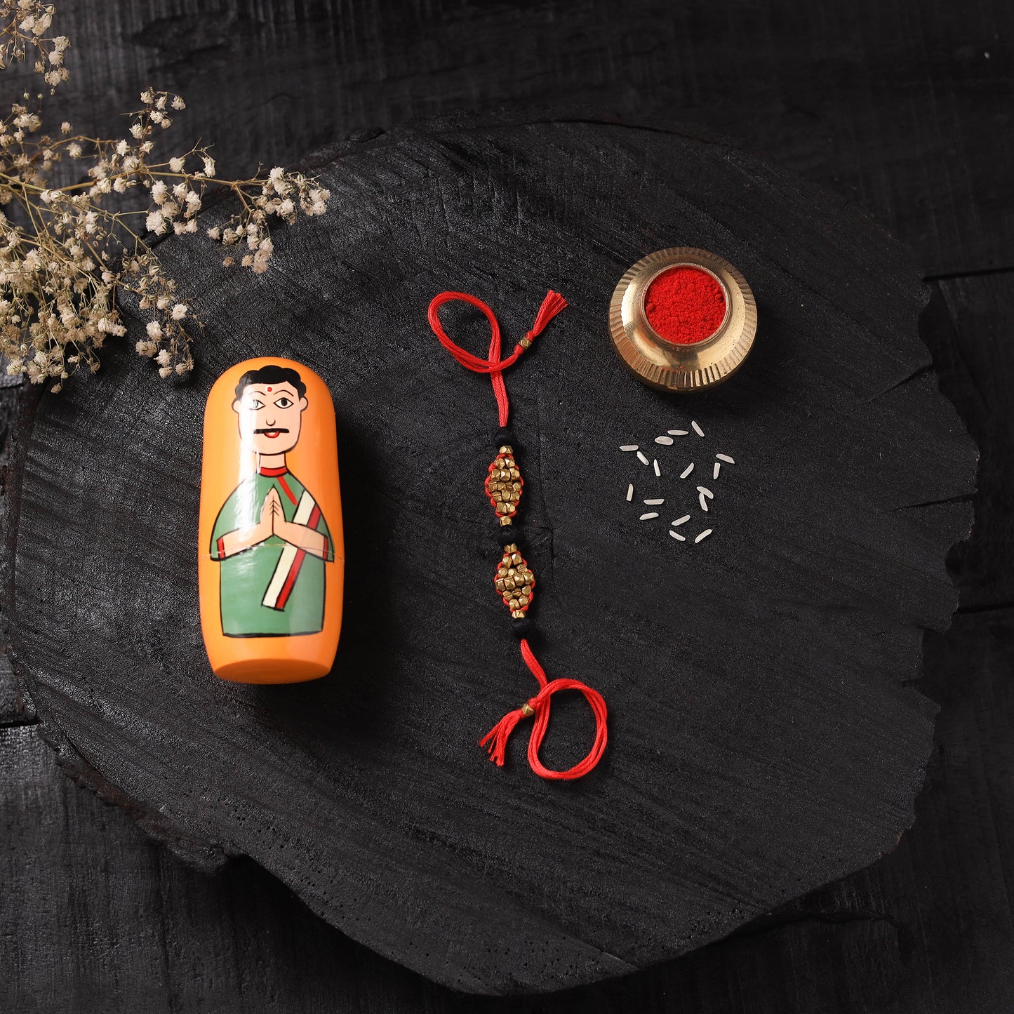 Red - Handcrafted Tribal Dokra Brass Thread Rakhi with Banaras Wood Doll Box 46