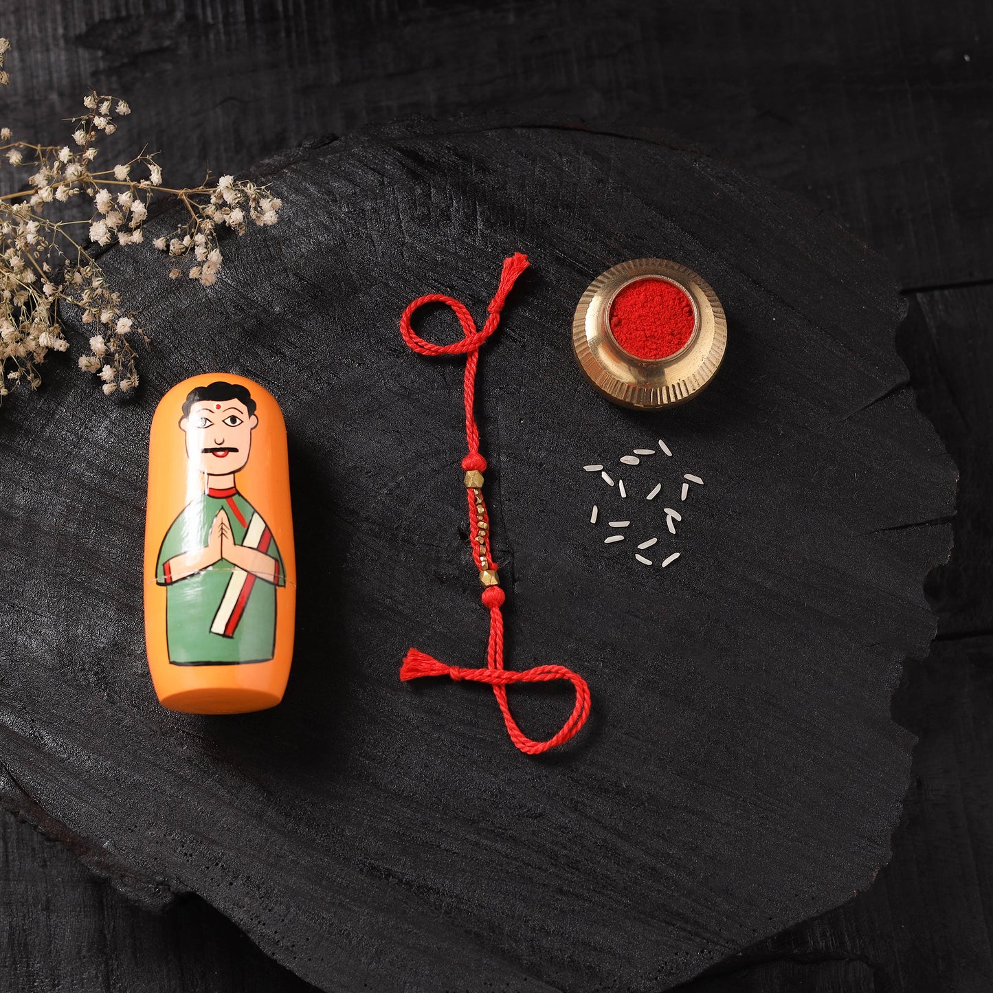 Red - Handcrafted Tribal Dokra Brass Thread Rakhi with Banaras Wood Doll Box 47