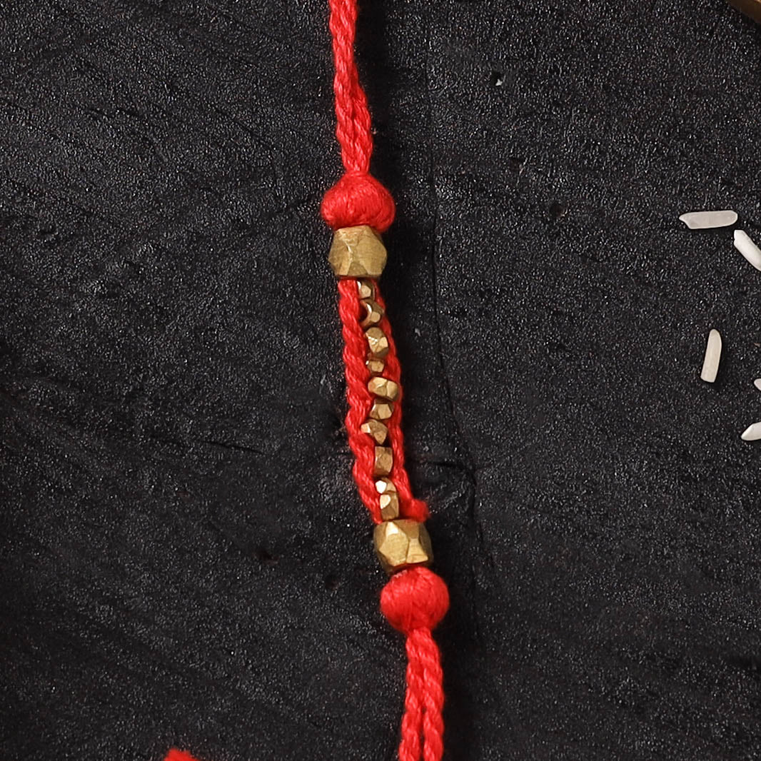 Red - Handcrafted Tribal Dokra Brass Thread Rakhi with Banaras Wood Doll Box 47
