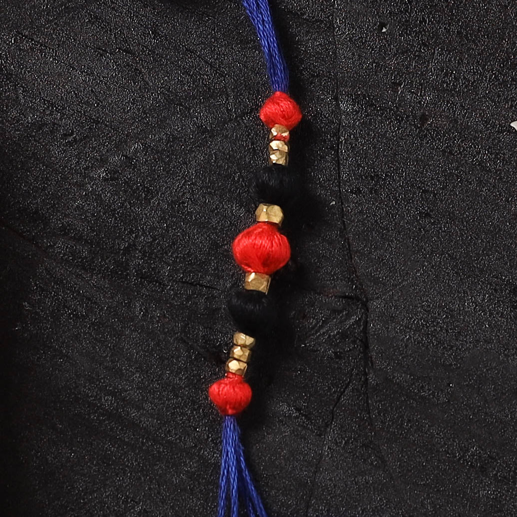 Blue - Handcrafted Tribal Dokra Brass Thread Rakhi with Banaras Wood Doll Box 48