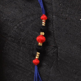 Blue - Handcrafted Tribal Dokra Brass Thread Rakhi with Banaras Wood Doll Box 48