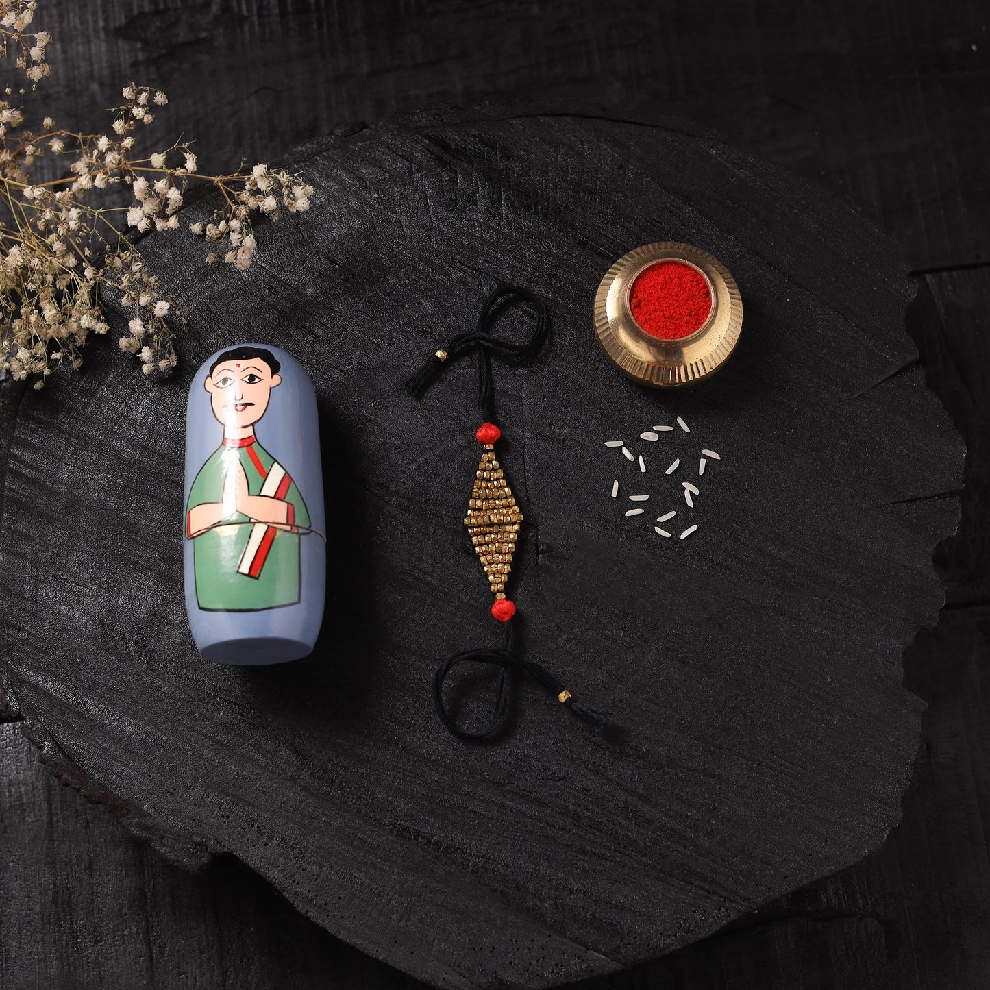 Black - Handcrafted Tribal Dokra Brass Thread Rakhi with Banaras Wood Doll Box 49