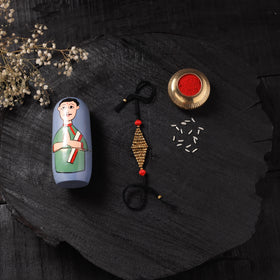 Black - Handcrafted Tribal Dokra Brass Thread Rakhi with Banaras Wood Doll Box 49