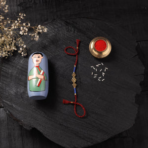 Red - Handcrafted Tribal Dokra Brass Thread Rakhi with Banaras Wood Doll Box 51