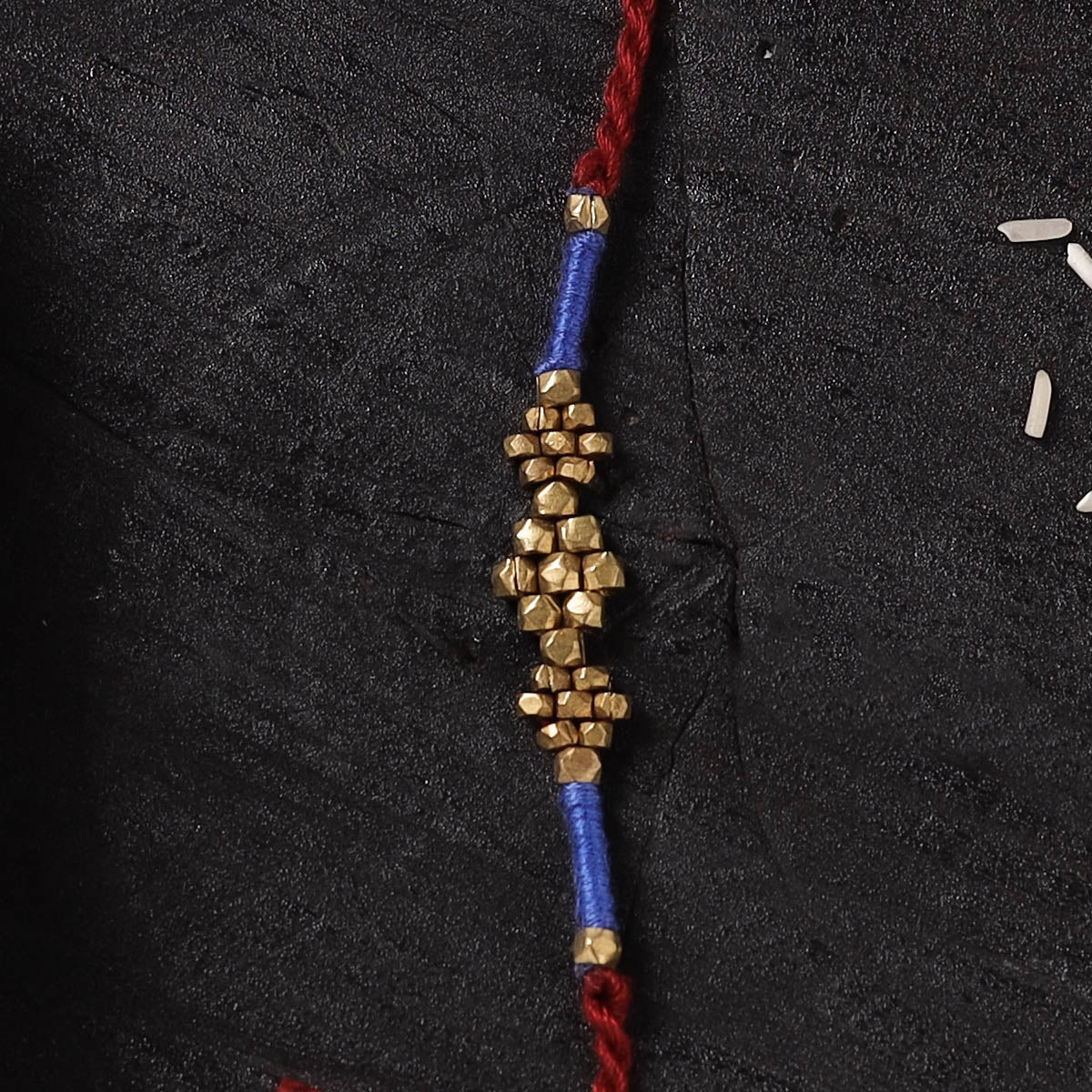 Red - Handcrafted Tribal Dokra Brass Thread Rakhi with Banaras Wood Doll Box 51