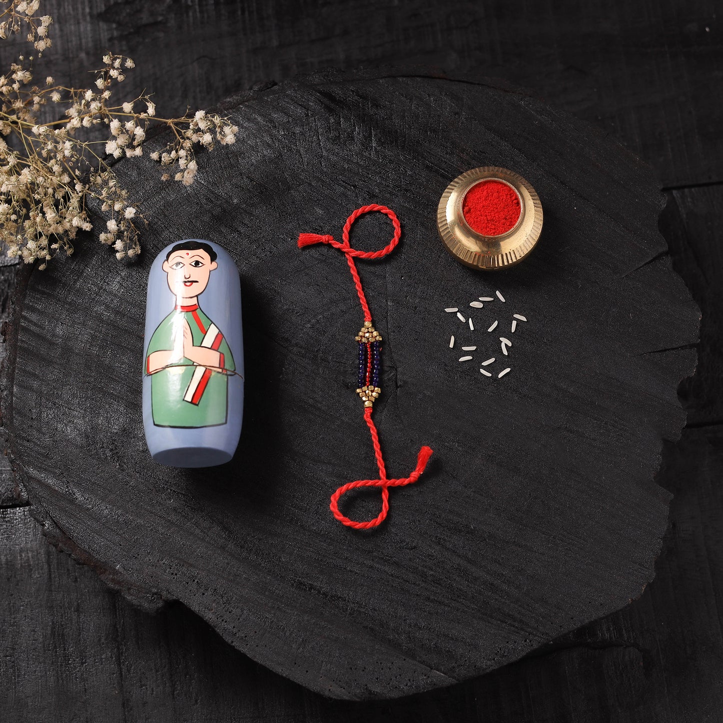 Red - Handcrafted Tribal Dokra Brass Thread Rakhi with Banaras Wood Doll Box 52