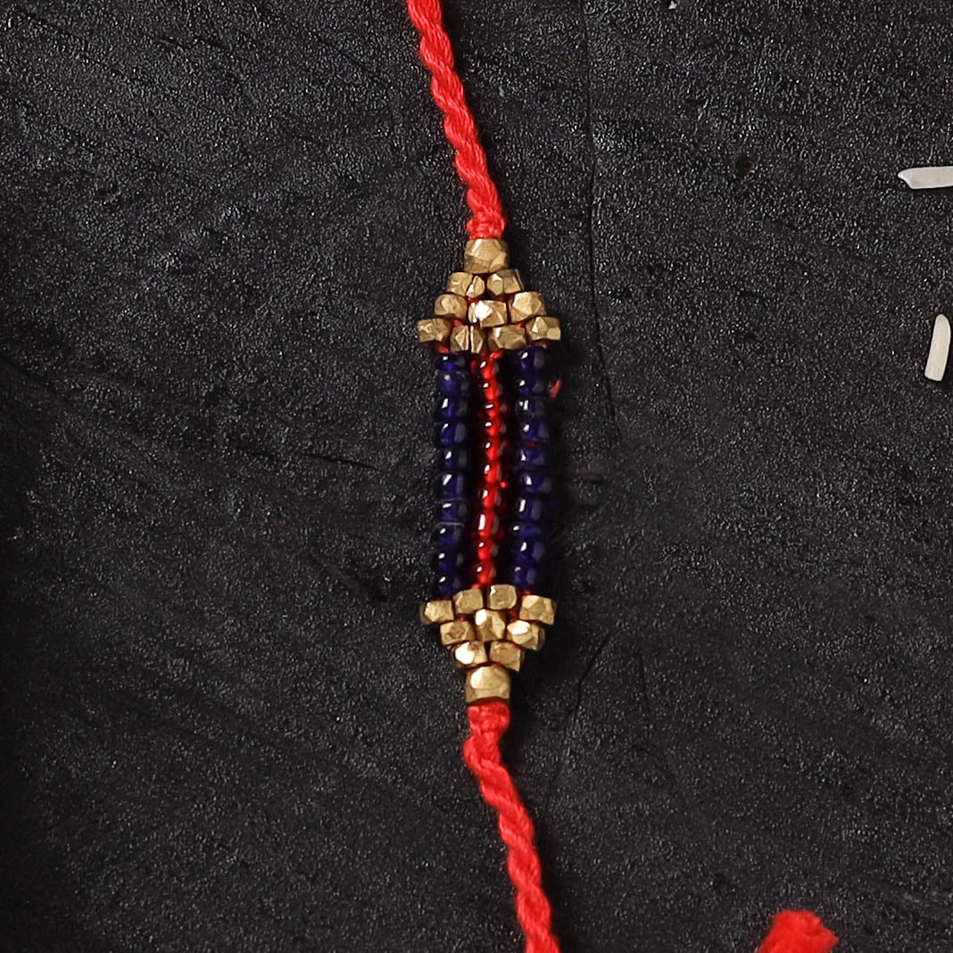 Red - Handcrafted Tribal Dokra Brass Thread Rakhi with Banaras Wood Doll Box 52