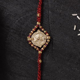 Red - Star Handcrafted Tribal Dokra Brass Thread Rakhi with Banaras Wood Doll Box 53