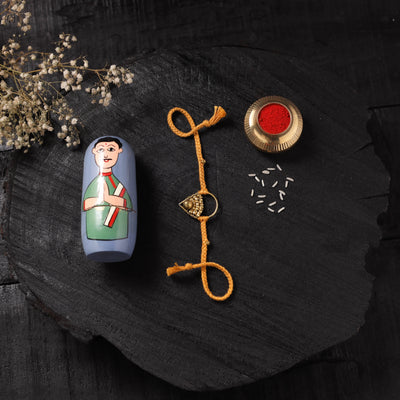 Yellow - Handcrafted Tribal Dokra Brass Thread Rakhi with Banaras Wood Doll Box 54