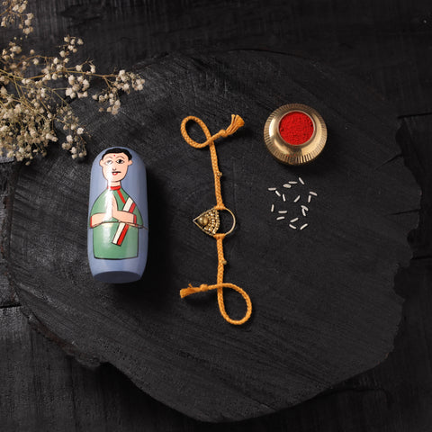 Yellow - Handcrafted Tribal Dokra Brass Thread Rakhi with Banaras Wood Doll Box 54