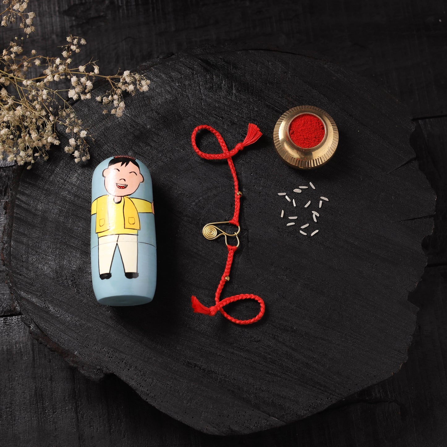Red - Handcrafted Tribal Dokra Brass Thread Rakhi with Banaras Wood Doll Box 55