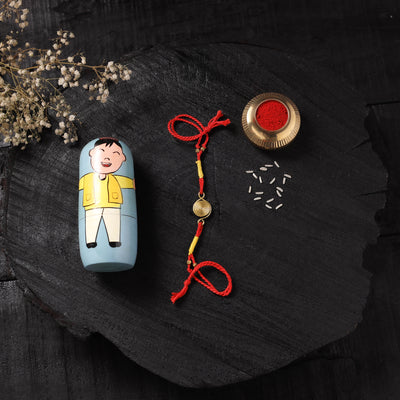Red - Handcrafted Tribal Dokra Brass Thread Rakhi with Banaras Wood Doll Box 57