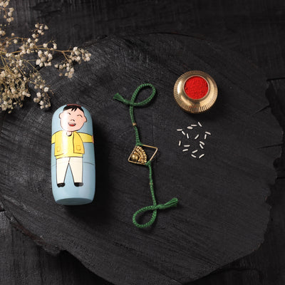 Green - Handcrafted Tribal Dokra Brass Thread Rakhi with Banaras Wood Doll Box 58