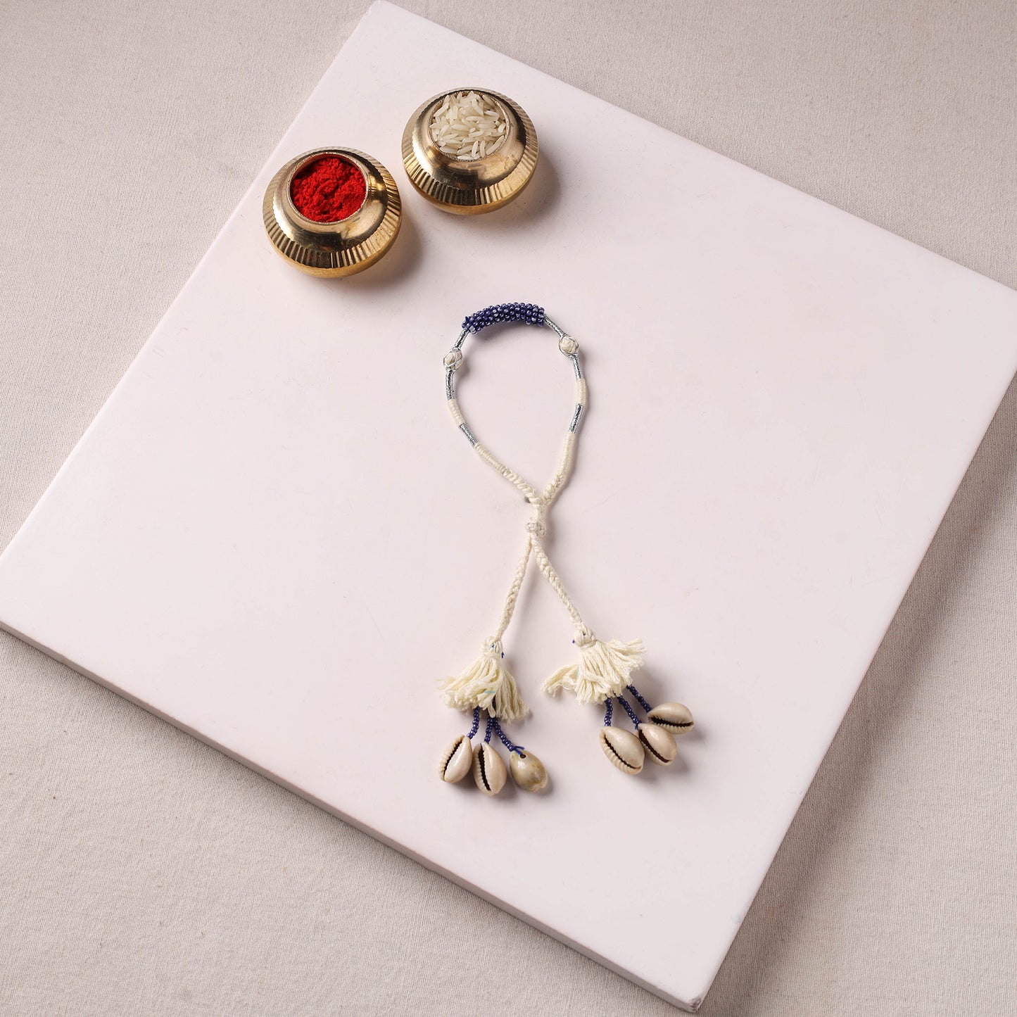 Anant Raksha Thread & Bead Work Lumba Rakhi / Bracelet with Potli 01