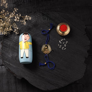 Blue - Handcrafted Tribal Dokra Brass Thread Rakhi with Banaras Wood Doll Box 60