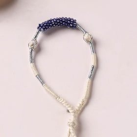 Anant Raksha Thread & Bead Work Lumba Rakhi / Bracelet with Potli 01