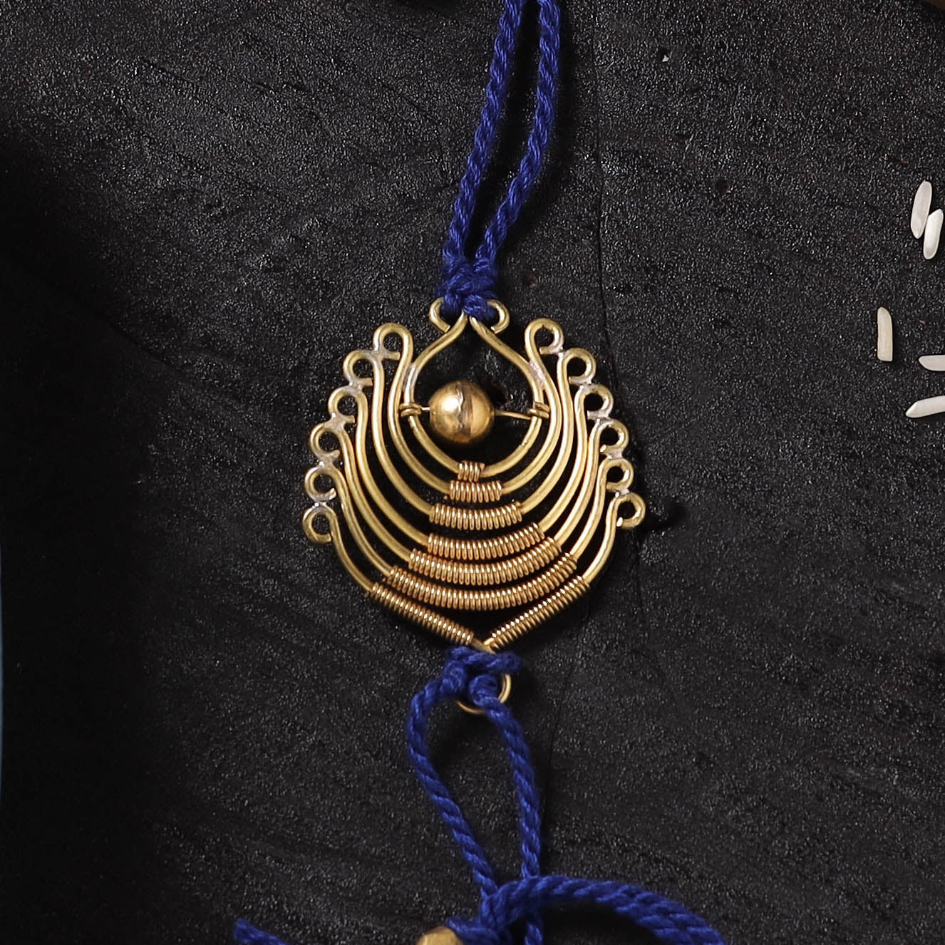 Blue - Handcrafted Tribal Dokra Brass Thread Rakhi with Banaras Wood Doll Box 60