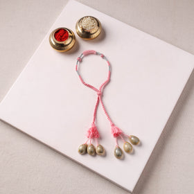 Anant Raksha Thread & Bead Work Lumba Rakhi / Bracelet with Potli 02