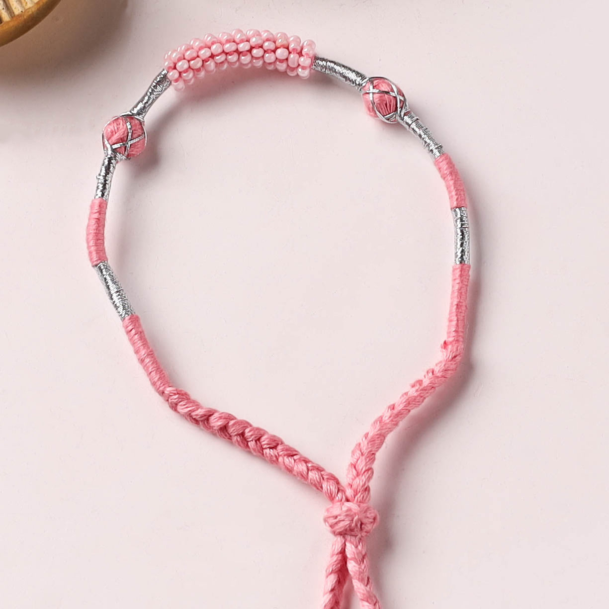 Anant Raksha Thread & Bead Work Lumba Rakhi / Bracelet with Potli 02