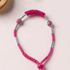 Anant Raksha Thread & Bead Work Lumba Rakhi / Bracelet with Potli 03