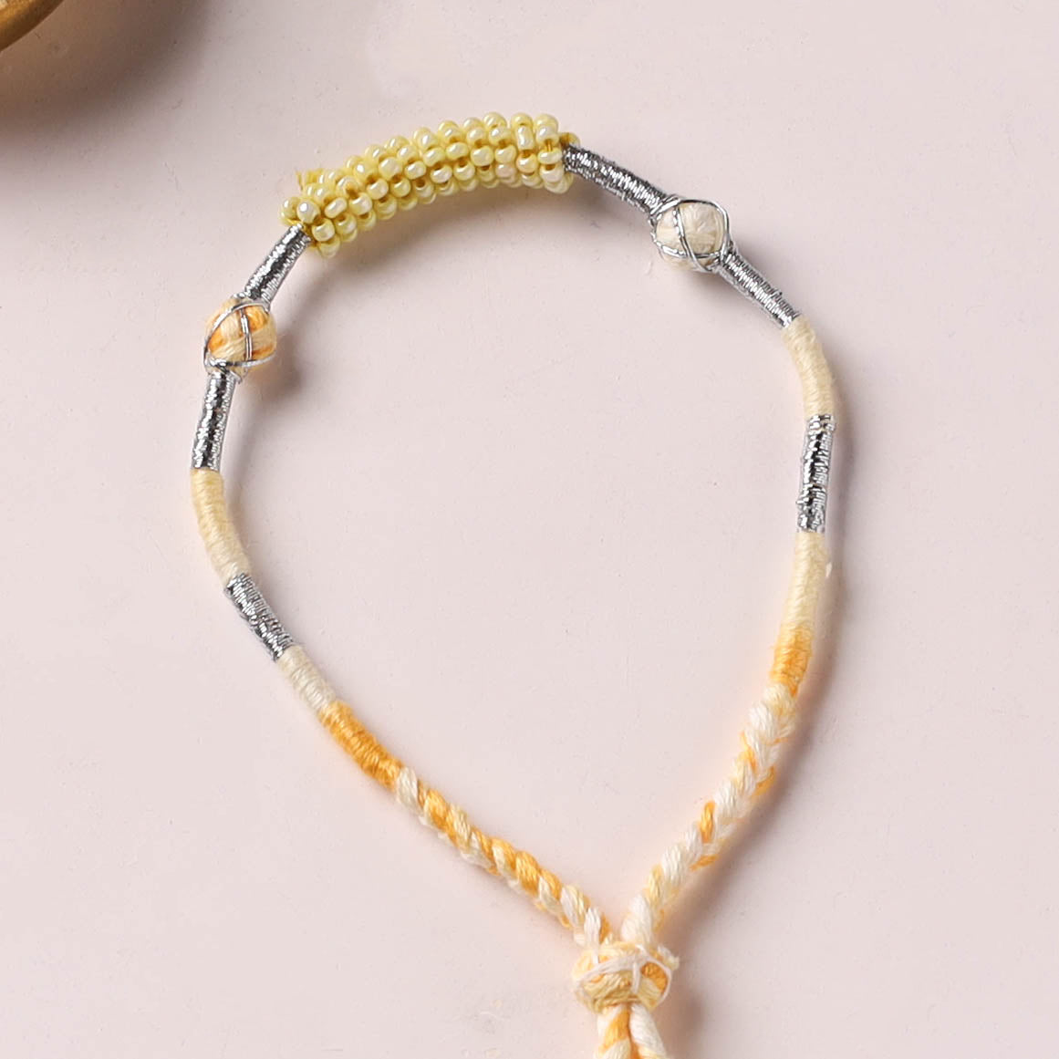Anant Raksha Thread & Bead Work Lumba Rakhi / Bracelet with Potli 04
