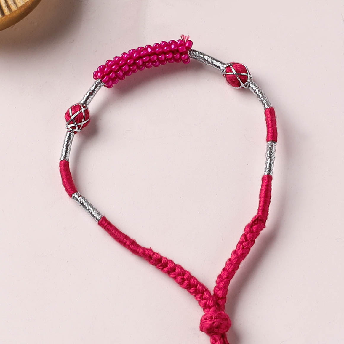 Anant Raksha Thread & Bead Work Lumba Rakhi / Bracelet with Potli 05