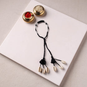 Anant Raksha Thread & Bead Work Lumba Rakhi / Bracelet with Potli 06