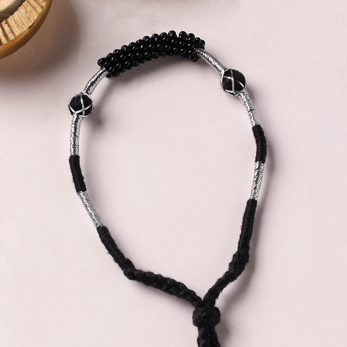 Anant Raksha Thread & Bead Work Lumba Rakhi / Bracelet with Potli 06