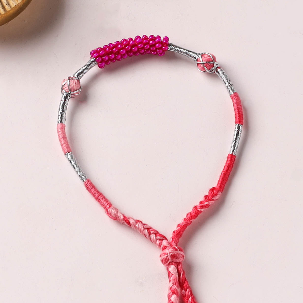 Anant Raksha Thread & Bead Work Lumba Rakhi / Bracelet with Potli 08
