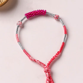 Anant Raksha Thread & Bead Work Lumba Rakhi / Bracelet with Potli 08