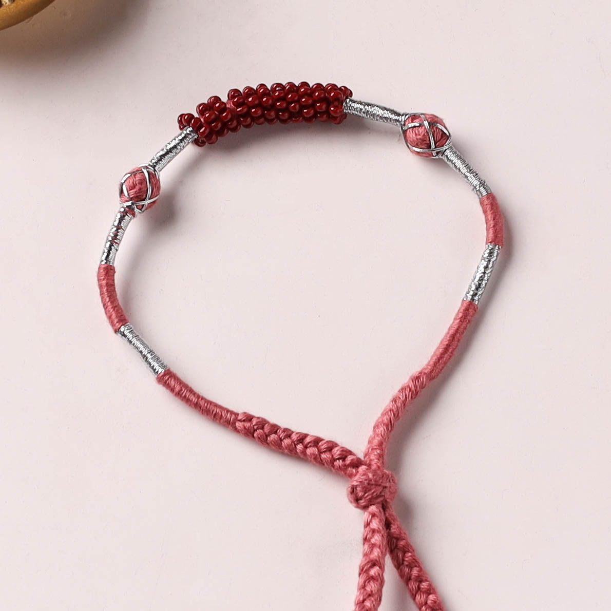 Anant Raksha Thread & Bead Work Lumba Rakhi / Bracelet with Potli 10