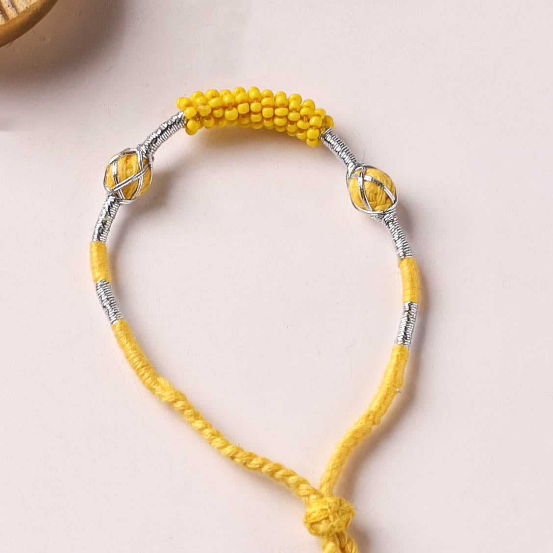 Anant Raksha Thread & Bead Work Lumba Rakhi / Bracelet with Potli 11