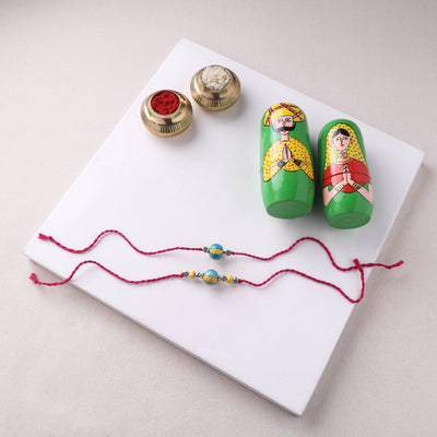 Yellow - Handmade Blue Pottery & GS Bead Work Bhaiya Bhabhi Rakhi Set with Banaras Wood Dolls Box 21