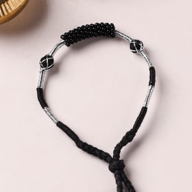 Anant Raksha Thread & Bead Work Lumba Rakhi / Bracelet with Potli 17