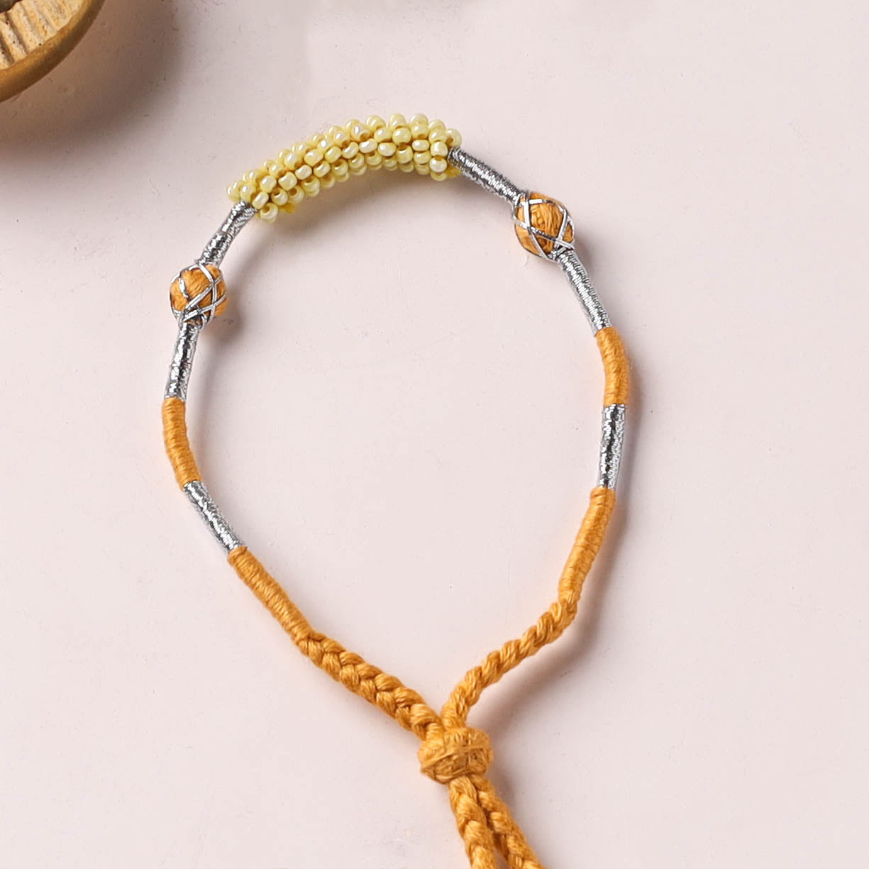 Anant Raksha Thread & Bead Work Lumba Rakhi / Bracelet with Potli 18