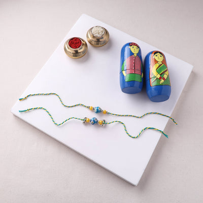 Blue - Handmade Blue Pottery & GS Bead Work Bhaiya Bhabhi Rakhi Set with Banaras Wood Dolls Box 24