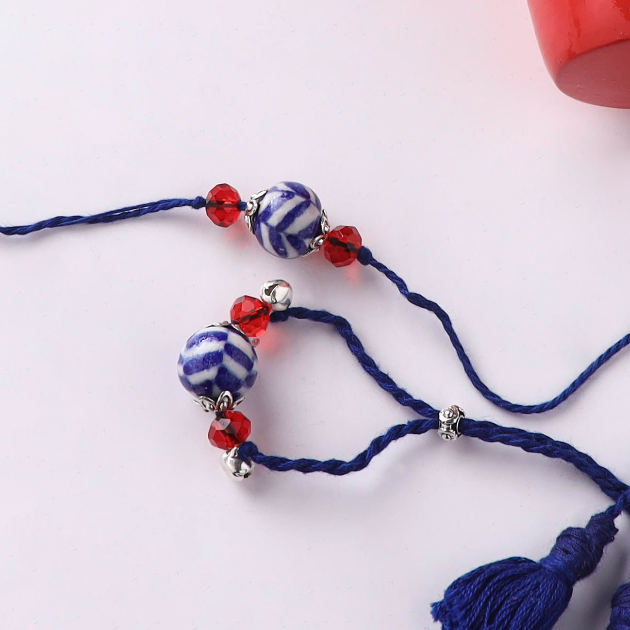 Blue - Pearls Handmade Blue Pottery & GS Bead Work Bhaiya Bhabhi Rakhi Set with Banaras Wood Dolls Box 27