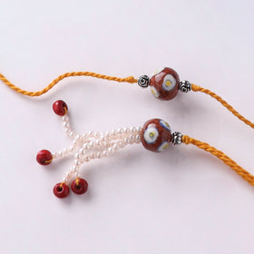 Red - Handmade Blue Pottery & GS Bead Work Rakhi Lumba Set with Banaras Wood Dolls Box 30