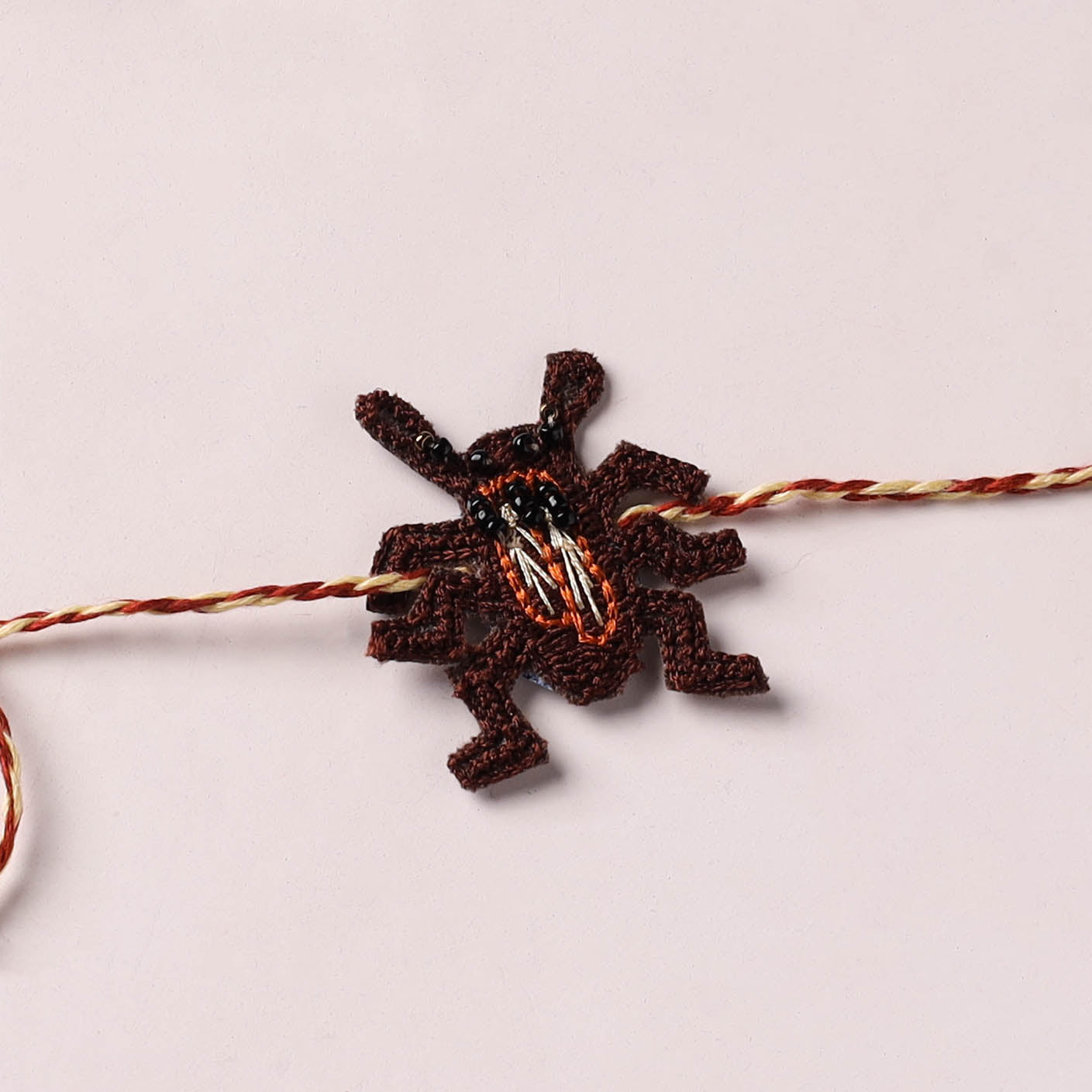 Cockroach - Reusable Hand Embroidered Bead Work Rakhi 03