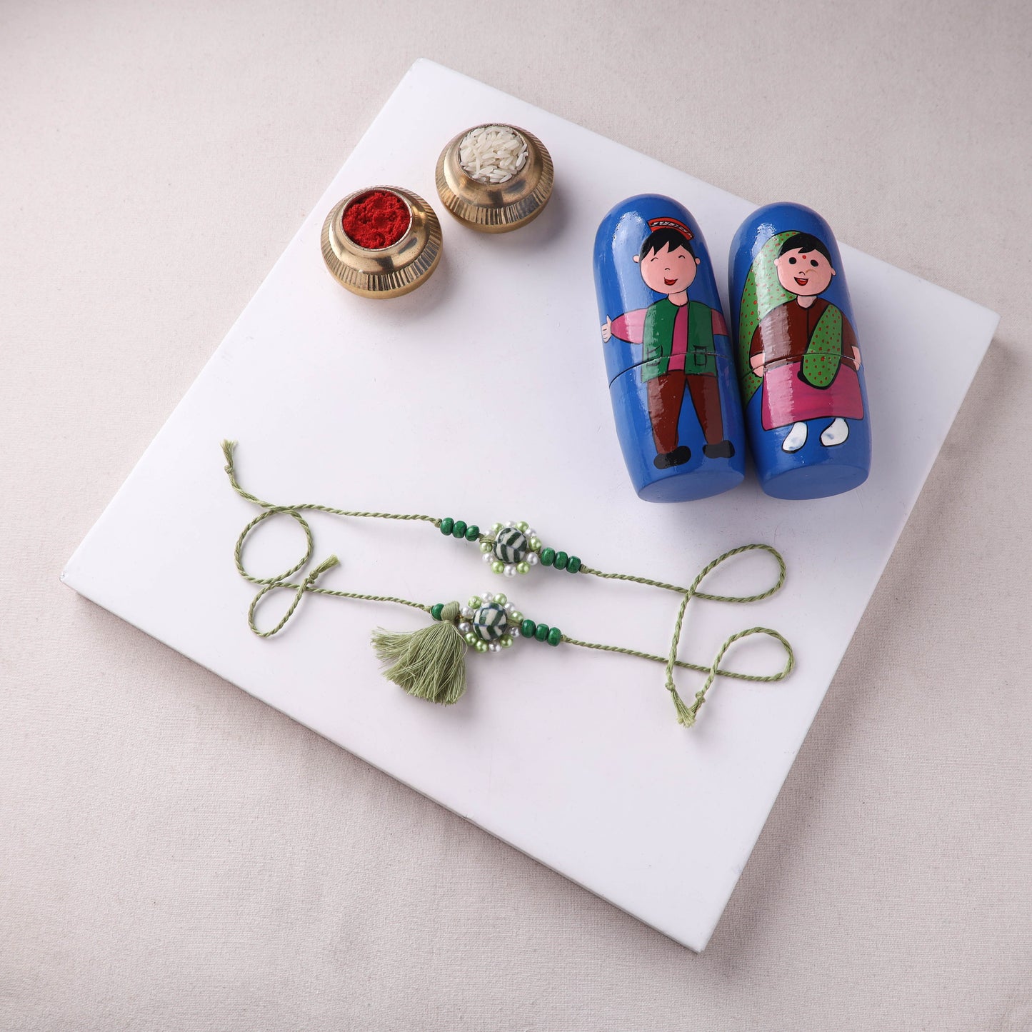Green - Handmade Blue Pottery & GS Bead Work Bhaiya Bhabhi Rakhi Set with Banaras Wood Dolls Box 35