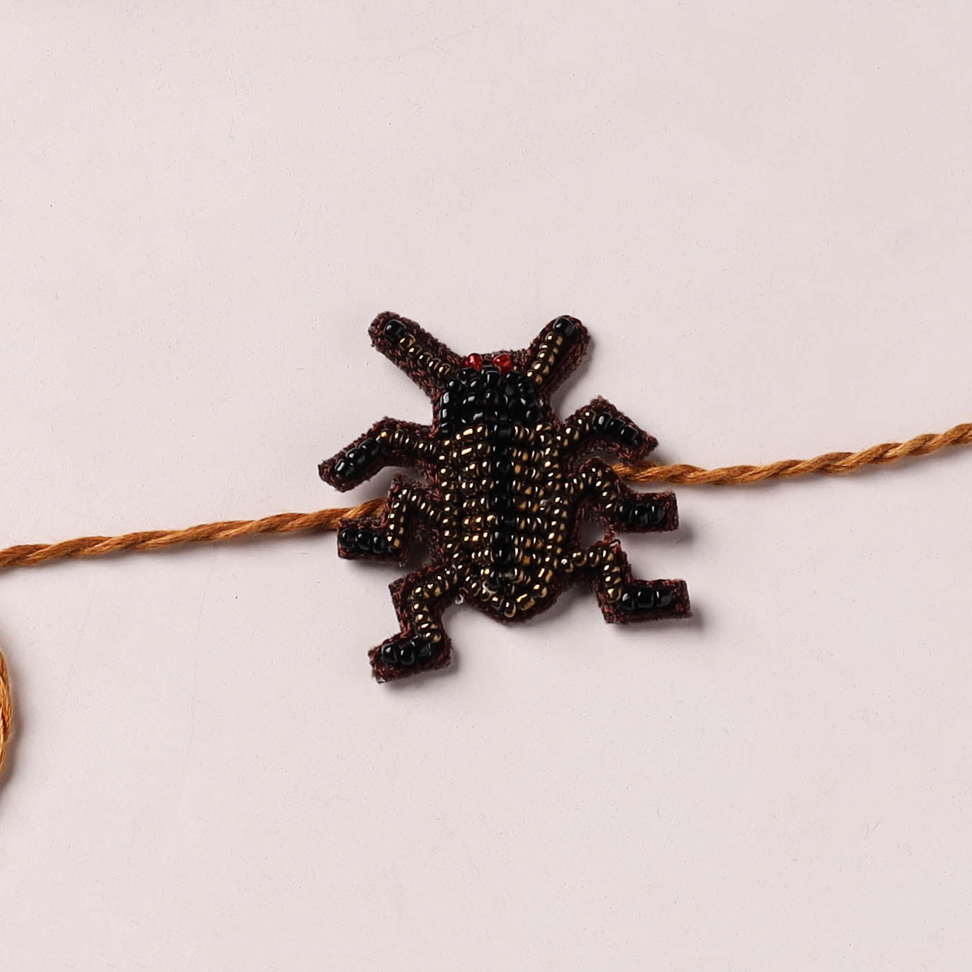 Cockroach - Reusable Hand Embroidered Bead Work Rakhi 04