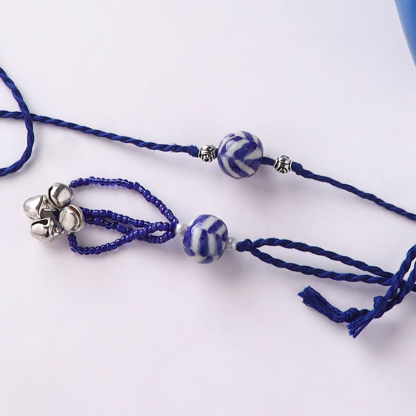 Blue - Handmade Blue Pottery & GS Bead Work Rakhi Lumba Set with Banaras Wood Dolls Box 36
