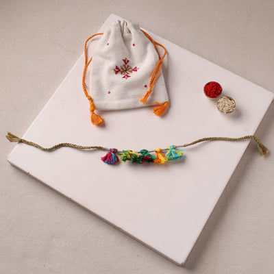 Anant Raksha Thread Work Rakhi with Soof Hand Embroidered Potli 18